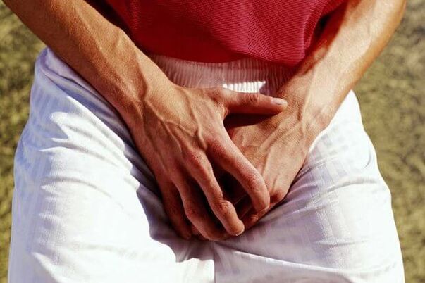 dor nos testículos de um homem